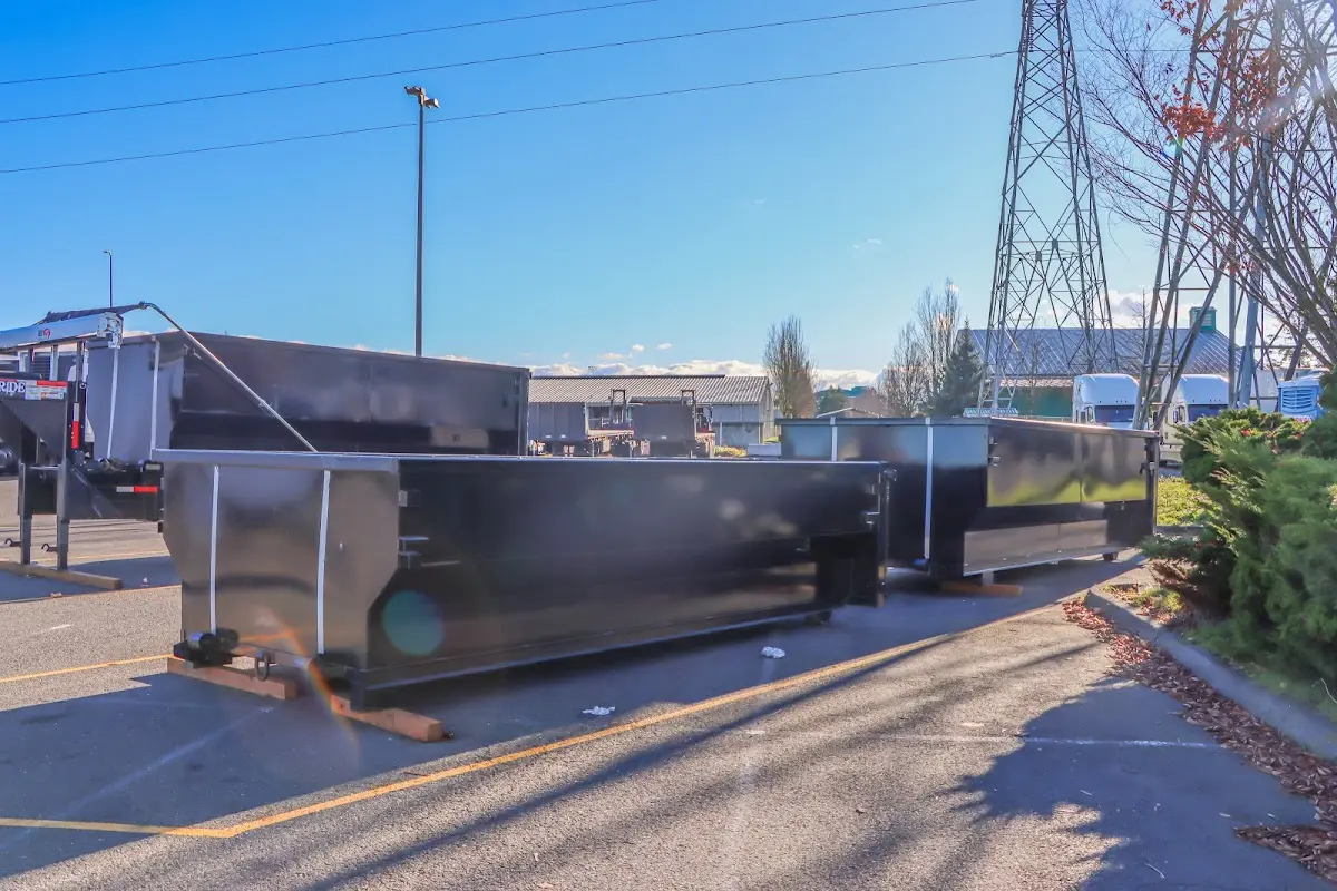 Roll-off dumpster ready for waste disposal at job site for 15 Yard Dumpster Rental in Tifton